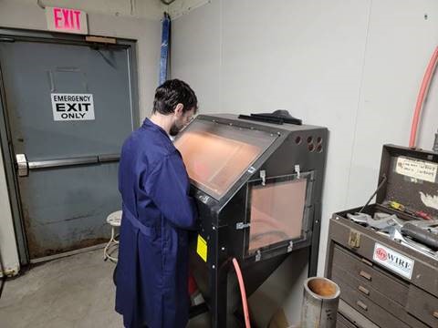Glass bead blasting a tube sample Glass bead blasting a tube sample