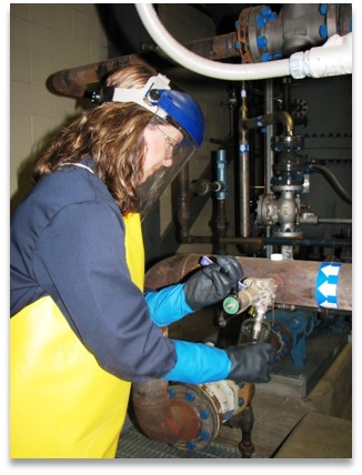 research engineer testing equipment for RSAT carbon capture equipment Babcock Wilcox